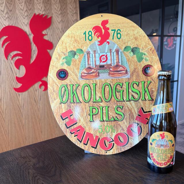 Metal skilt med Økologisk Pils etiket